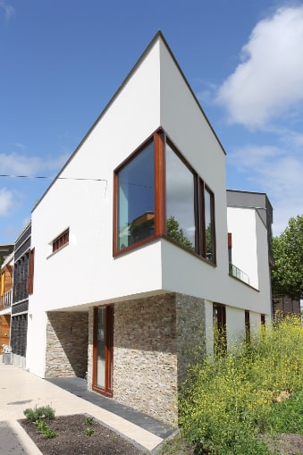 Mid Century Modern FAQs - Imagine architecture with clean lines and simple shapes. This Modern Dutch Home with white facade is fine example of classic modern design